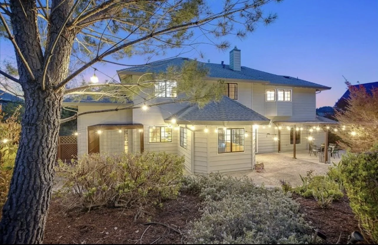 Two-story home exterior at twilight